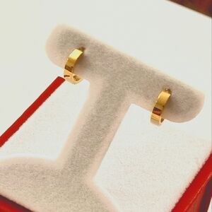 14k Yellow Gold Mini Huggie Earrings. Very tiny; for 2nd or 3rd piercing.